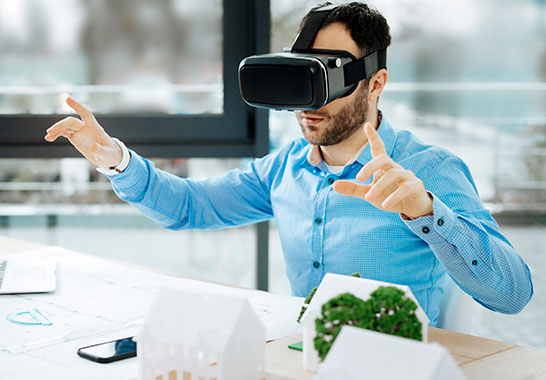 man on vr headset observing his architecture designs