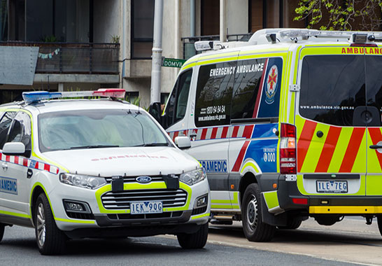 picture of an ambulance and suv