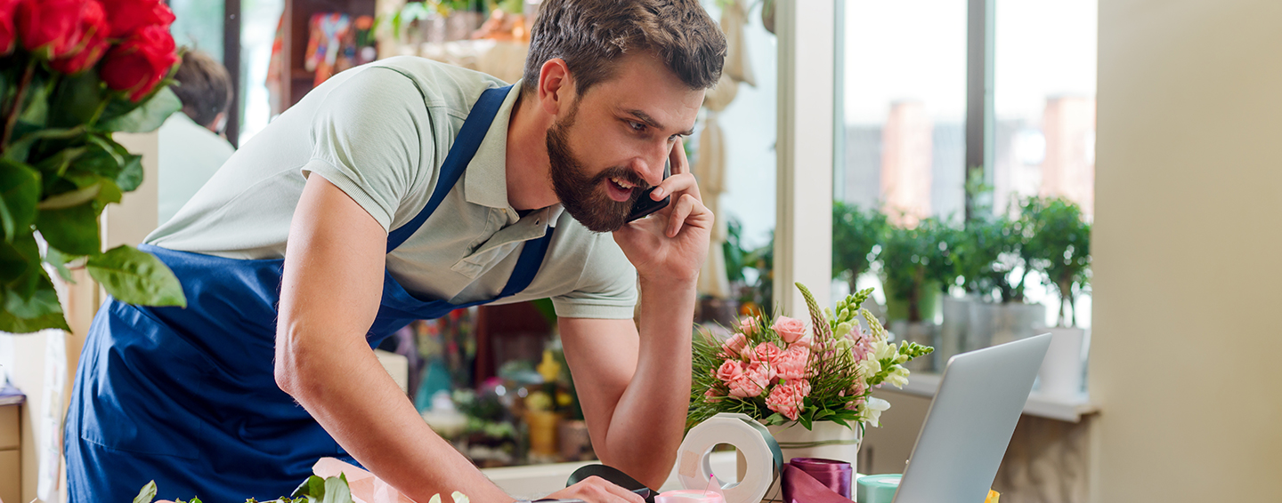 Business owner reviewing internet solutions