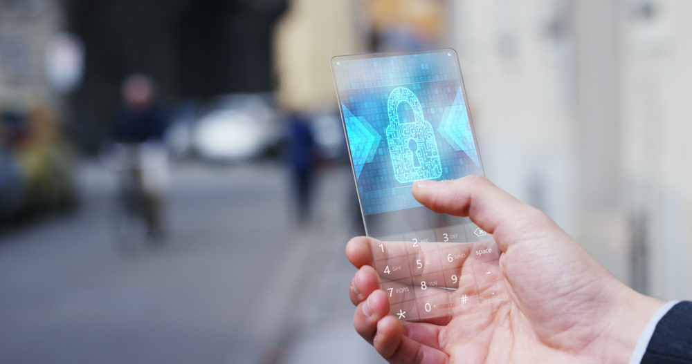man holding glass phone