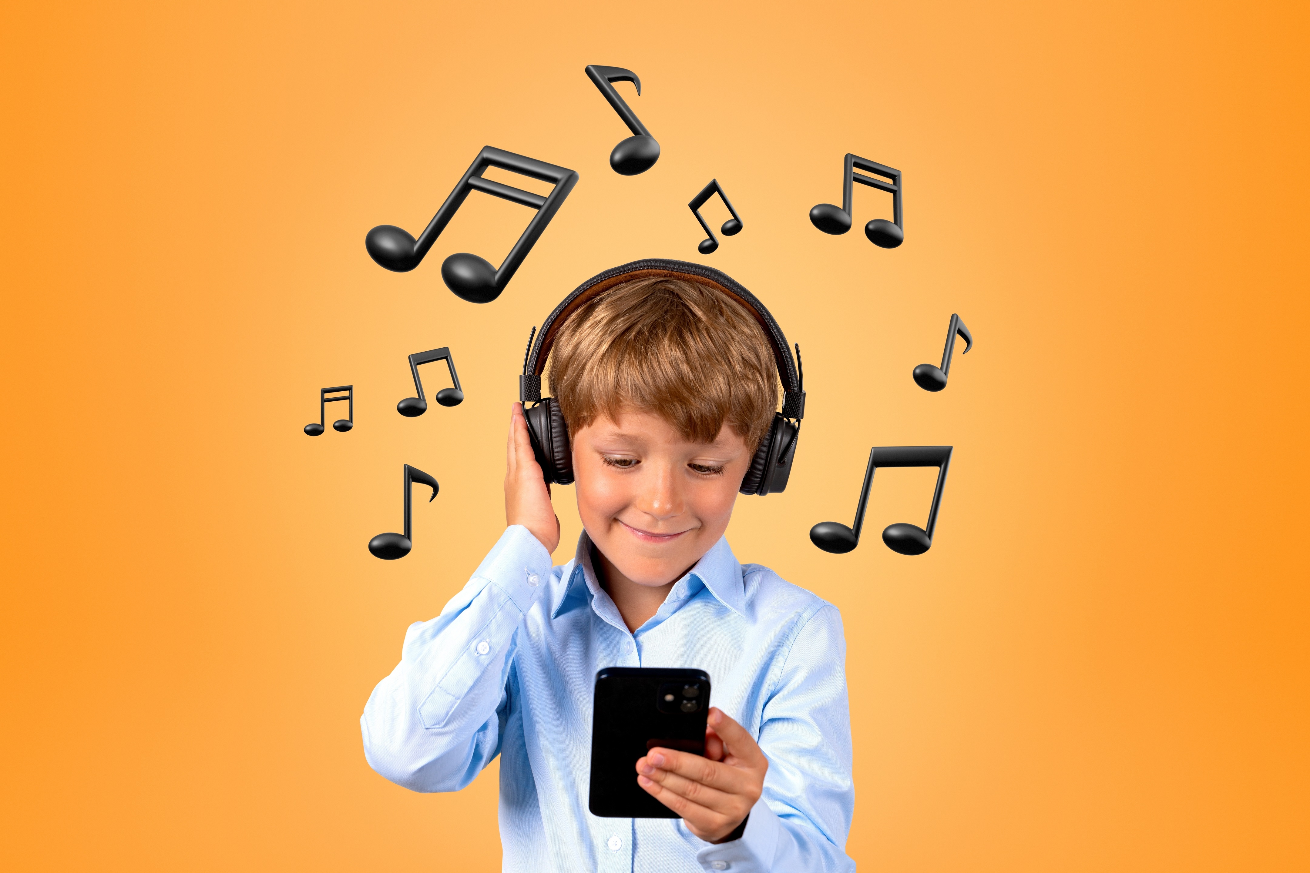 Boy with headphones on Listening to music on phone