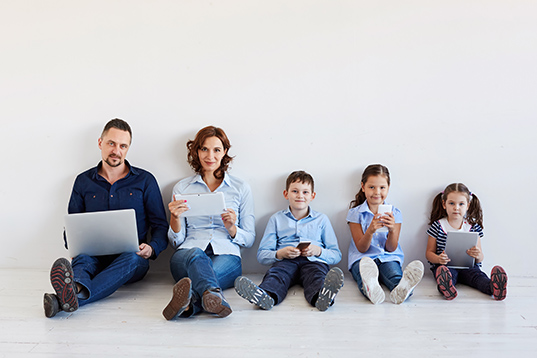 Image of a Family on Electronic Devicess